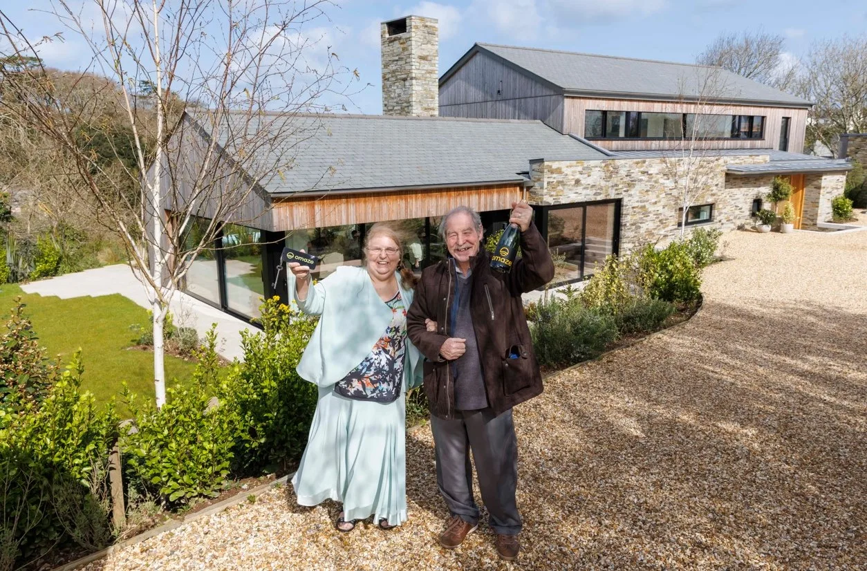 73-year-old Rose Doyle in front of her newly won $3 million home